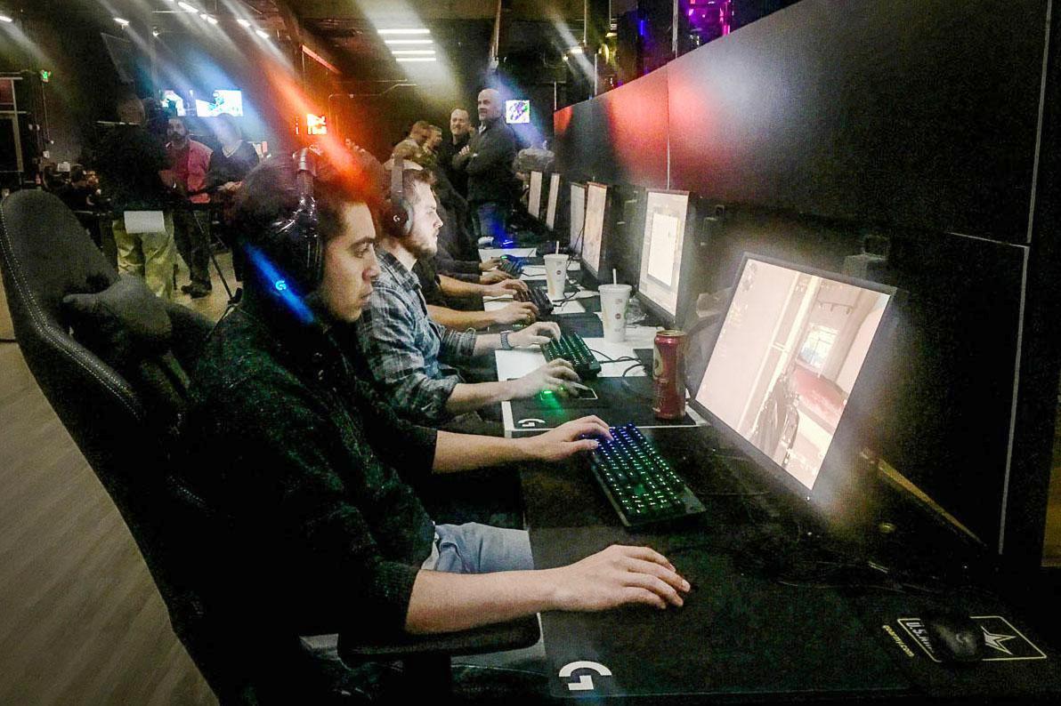 Andrew Garcia, 22, plays 'Call of Duty: Modern Warfare' at the Localhost Denver Arena during an October Army recruiting event. Photo: Taylor Allen, Colorado Public Radio